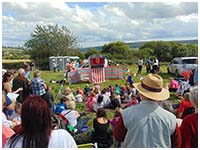 Crowds watching Professor Dan Slater, children's entertainer, York 